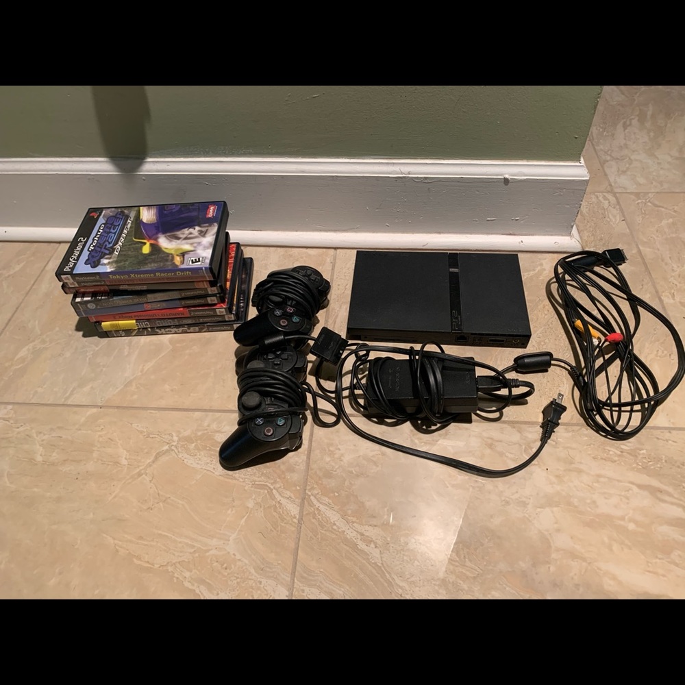 SOLD Ps2 slim with games ! Tested!